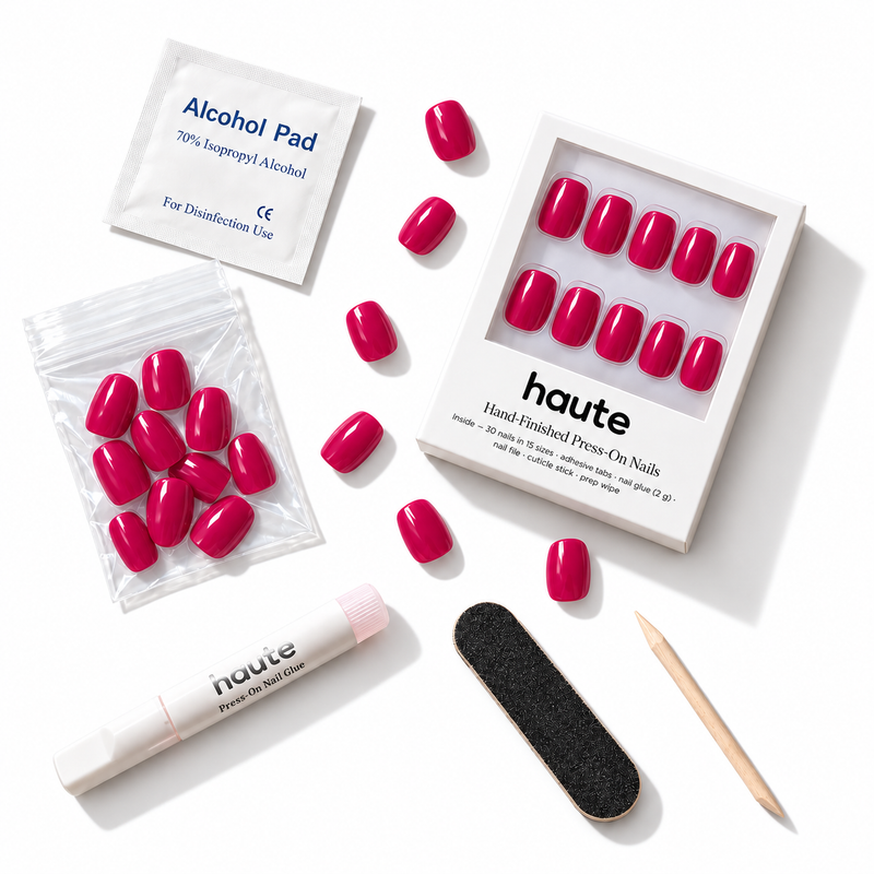 what's in the cherry secret box: 30 nails in 15 sizes, nail glue, adhesive tabs, file, cuticle stick and prep wipe