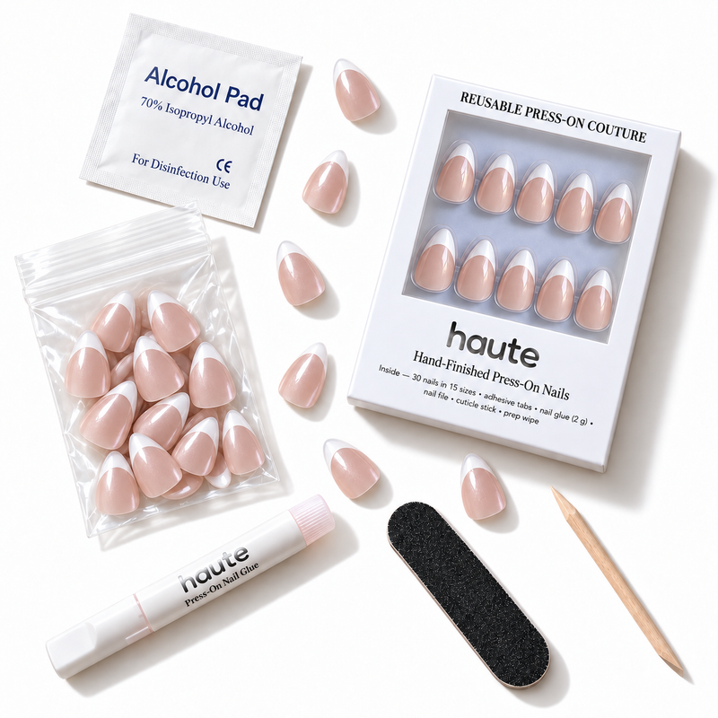 what's in the oui bebe box: 30 nails in 15 sizes, nail glue, adhesive tabs, file, cuticle stick and prep wipe