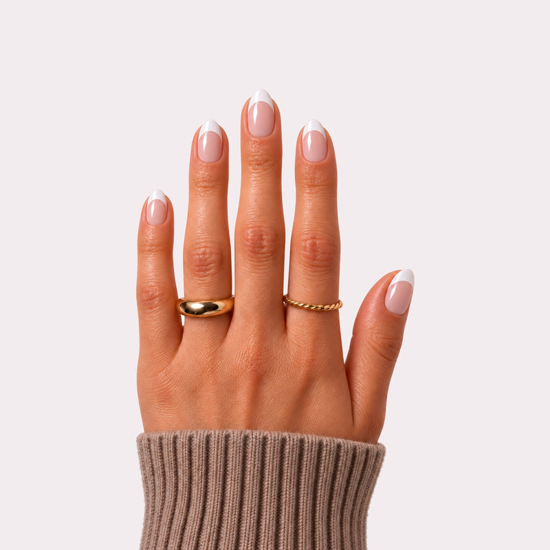 haute oui bebe press-on nails on hand