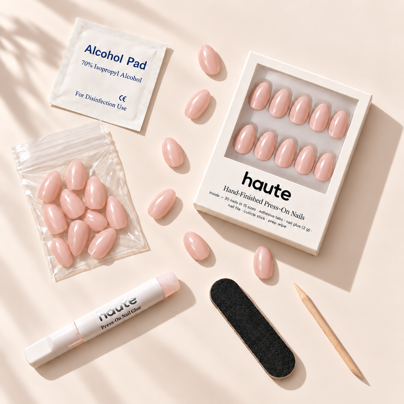 what's in the peach affair box: 30 nails in 15 sizes, nail glue, adhesive tabs, file, cuticle stick and prep wipe