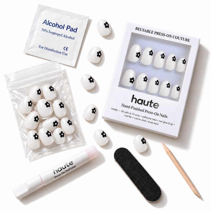 what's in the petal party box: 30 nails in 15 sizes, nail glue, adhesive tabs, file, cuticle stick and prep wipe