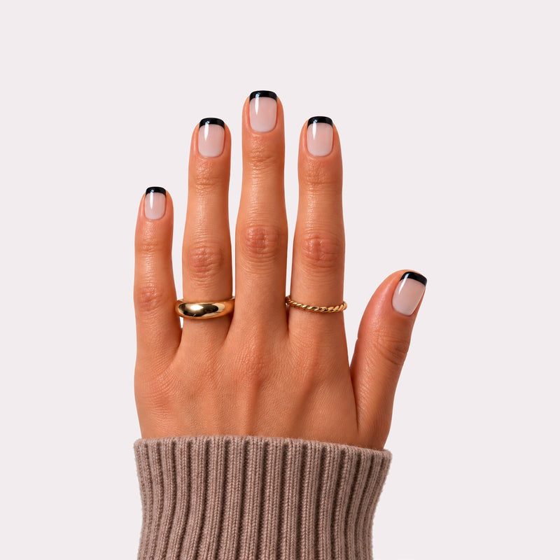 haute black tie press-on nails on hand