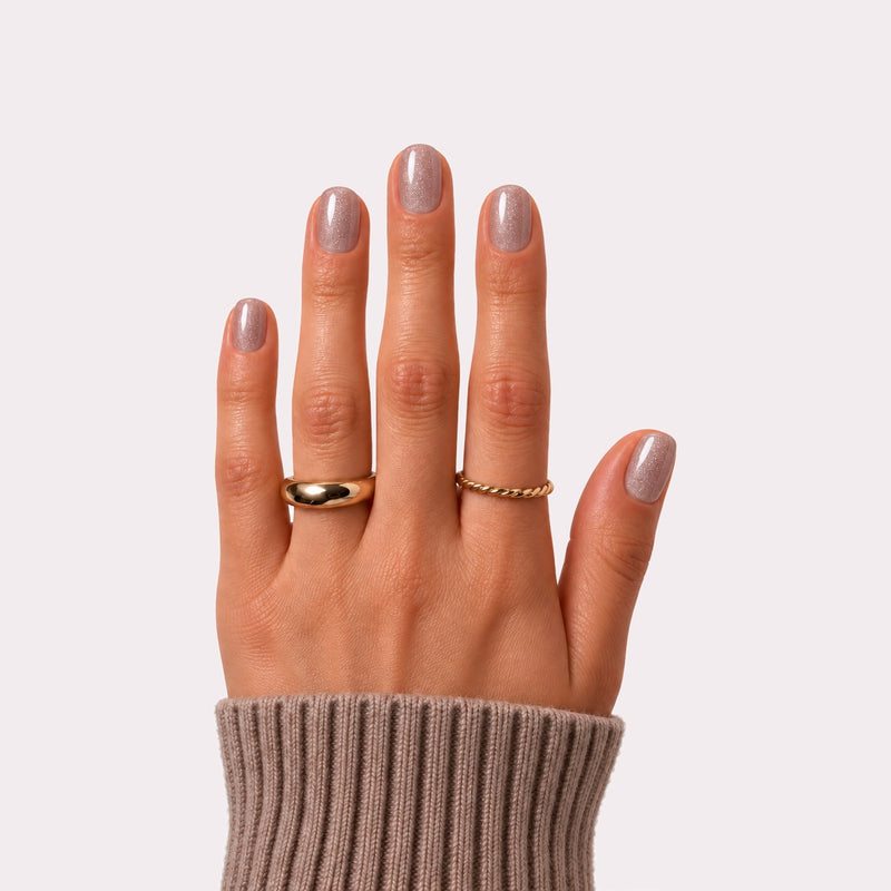 haute champagne hush press-on nails on hand