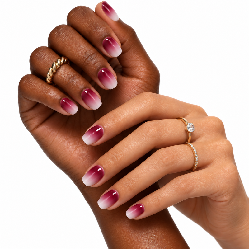 cherry on mute press-on nails shown on two skin tones