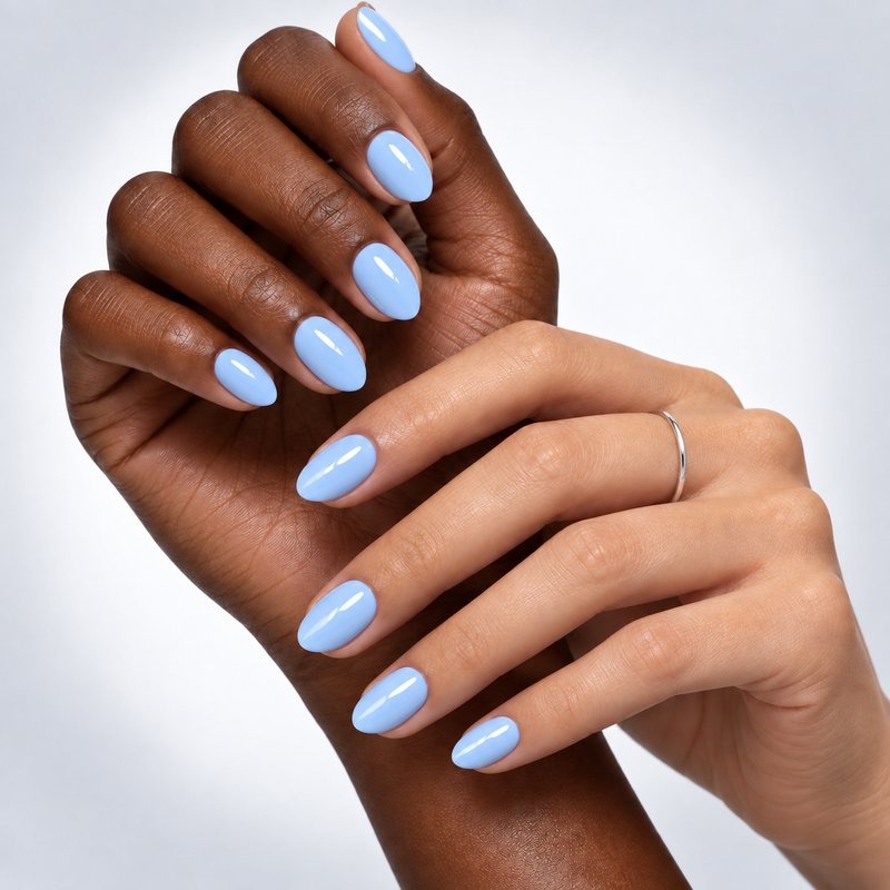 cloud nine-ish press-on nails shown on two skin tones
