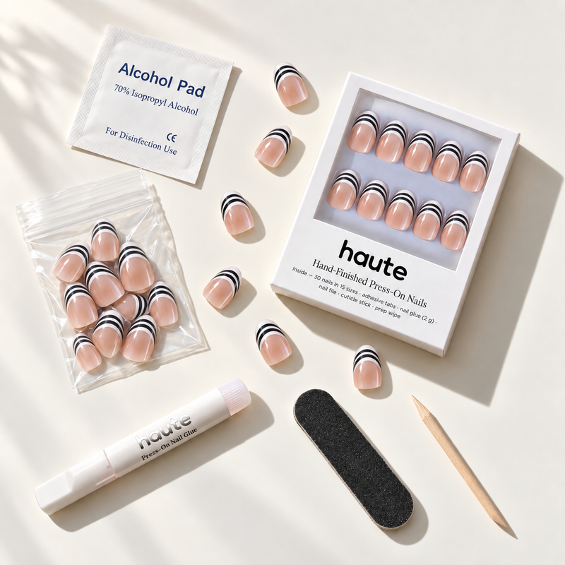 what's in the double take box: 30 nails in 15 sizes, nail glue, adhesive tabs, file, cuticle stick and prep wipe