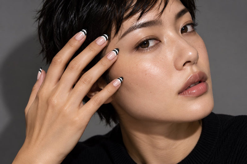 Model wearing haute double take press-on nails