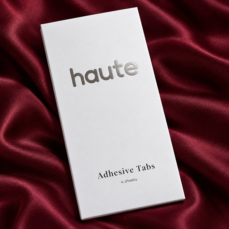 the switch adhesive tabs box on burgundy satin
