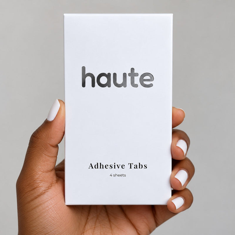 the switch adhesive tabs box held in hand